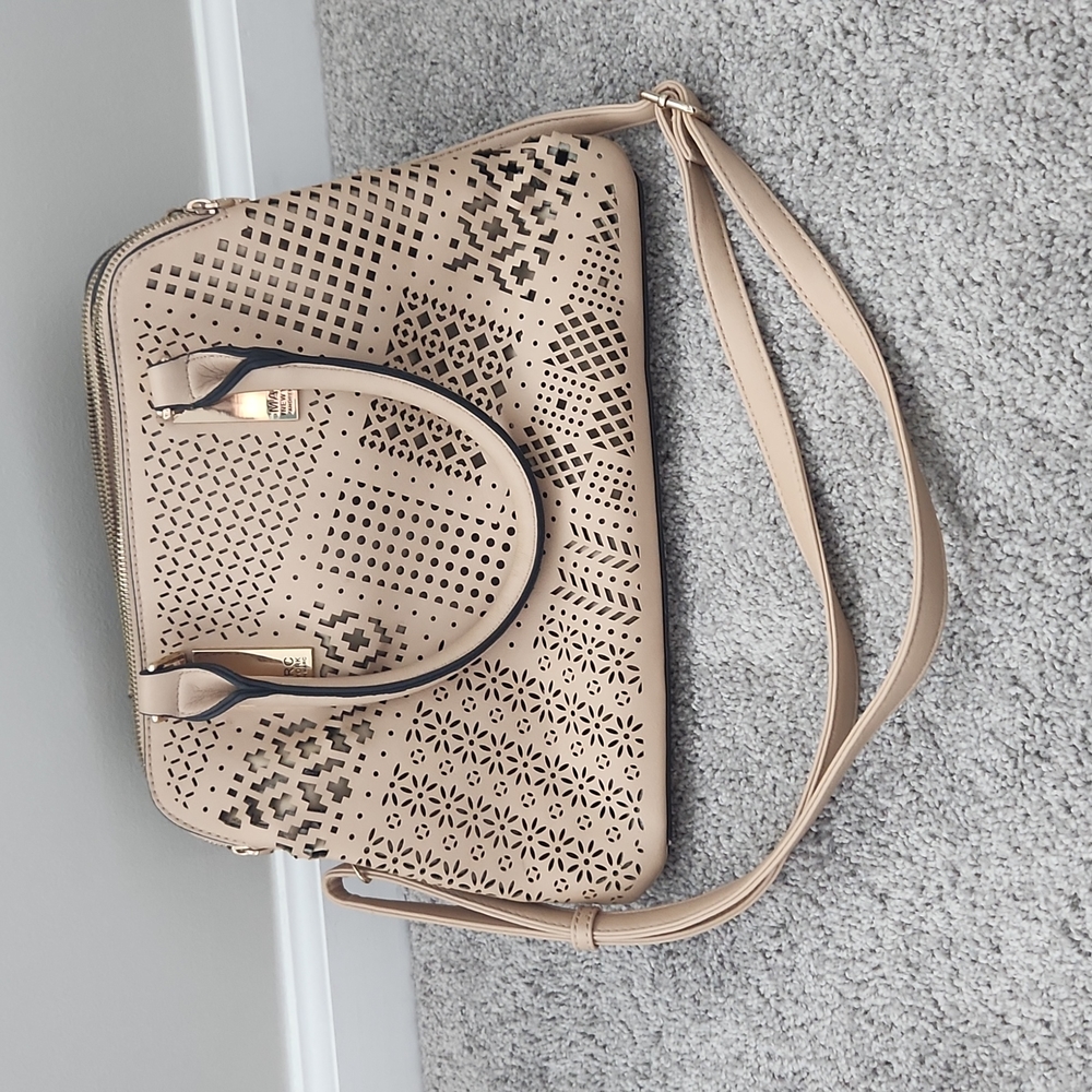 Laser cutout tan crossbody bag